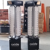 Branded Metal Rotating Eyewear Display Rack with Wheels, 360° Spin Optical Shop Glasses Showcase