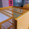 Yellow Metal Industrial Display Rack with Wheels & Branding, Mobile Shelf for Construction Supplies