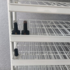 Metal Multi - Tier Wire Shelf Display Rack with Branding Signage, Retail Stand for Cosmetics & Small Goods